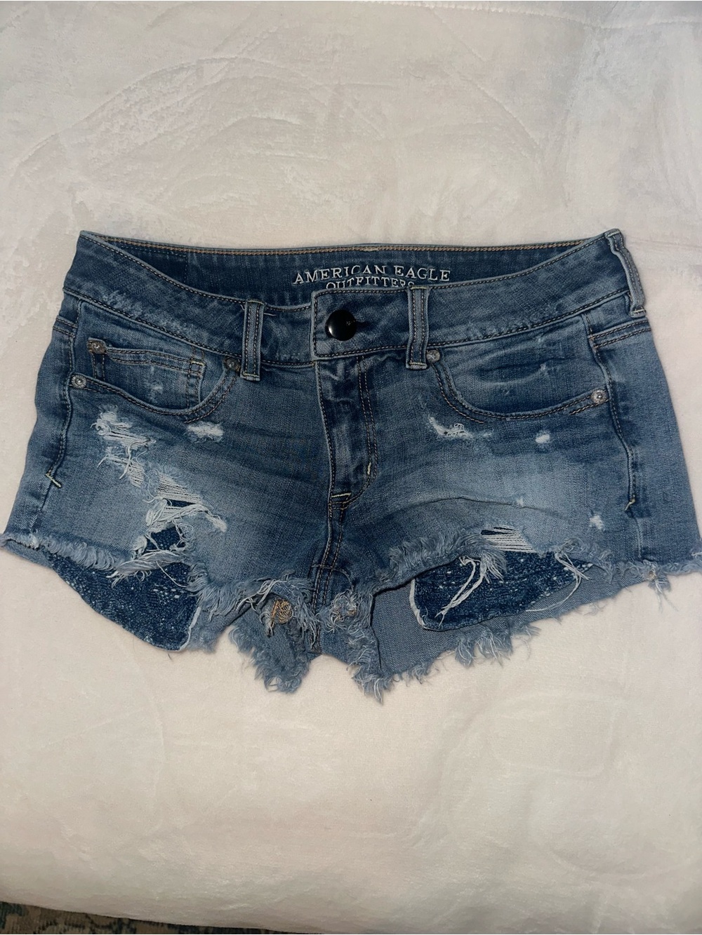 American Eagle Distressed Denim Cutoff Booty Shorts - Blue